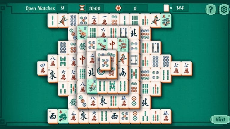 Close-up of Mahjongg Solitaire tiles in vibrant colors.